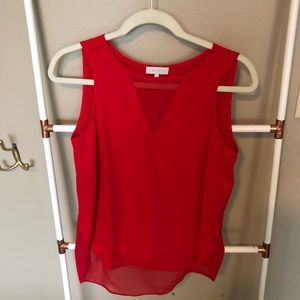 Red sleeveless “going out” top